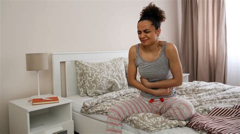 Pregnant woman experiencing nausea